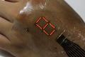 Electronic skin turns hands into a phone