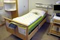 The bed helps the patient lessen pain