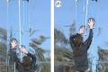 Made gloves help people climb the vertical glass wall