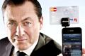 Insert a credit card into your mobile phone for payment