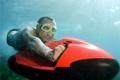 Producing canoe diving underwater
