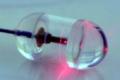 Necklace with optical capsules