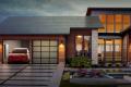 Tesla's solar roof tile is cheaper than regular tile roofs, with a permanent warranty