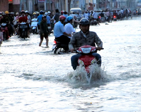 Picture 1 of 20% of Saigon area is flooded when the sea level rises by one meter