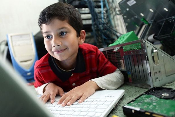 Picture 1 of 5 year old baby becomes the youngest computer expert
