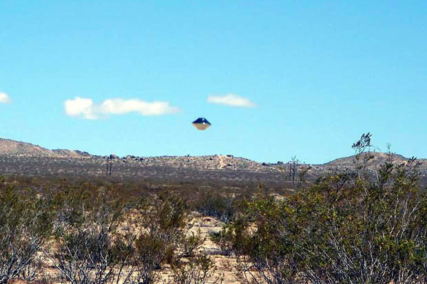 Picture 1 of A clear picture of a UFO near a military base
