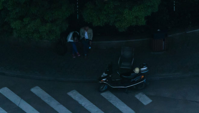 Picture 9 of A picture of the whole city of Shanghai, zoomed to the pedestrian's face