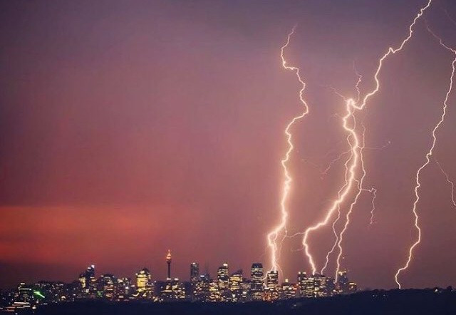 Picture 1 of After a record heat, Sydney put lightning on