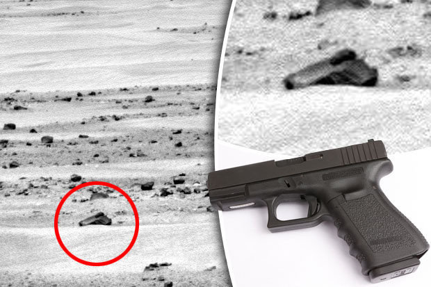 Picture 1 of Aliens equipped with weapons on Mars?