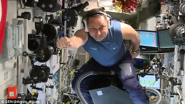 Picture 1 of Astronaut riding a vacuum cleaner flying in space