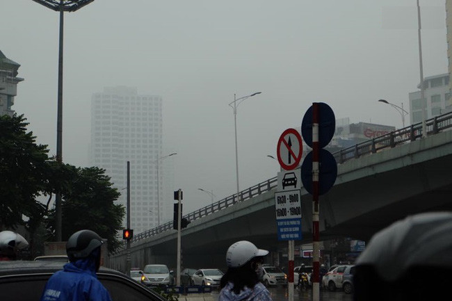 Picture 2 of Beams: Near noon, Hanoi fades in a dense fog