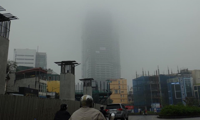 Picture 8 of Beams: Near noon, Hanoi fades in a dense fog