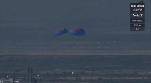 Picture 1 of Blue Origin's rocket after launching still landed and safely escaped