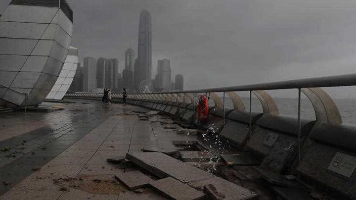 Picture 6 of Broken pavement, sunken cars in super storm Hato in China