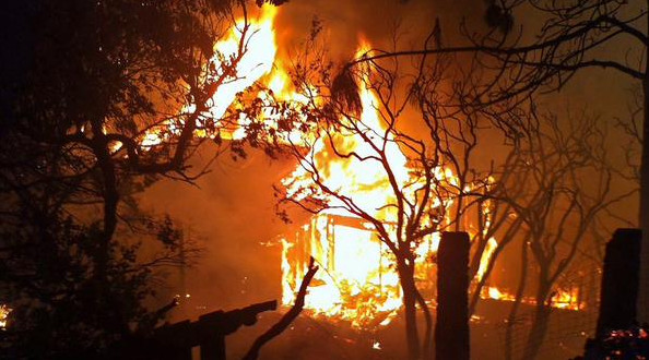 Picture 3 of California sinks in 'hell fire'