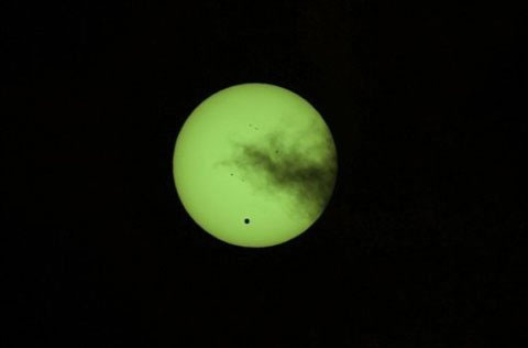 Picture 11 of Century astronomical banquet: Venus passes through the Sun.