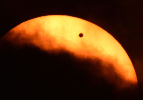 Picture 13 of Century astronomical banquet: Venus passes through the Sun.