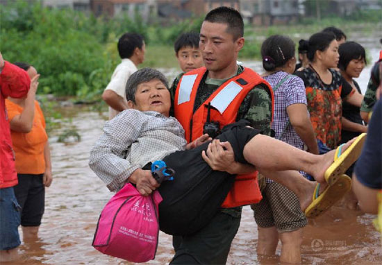 Picture 1 of China: Nearly 100 people died and went missing because of the flood