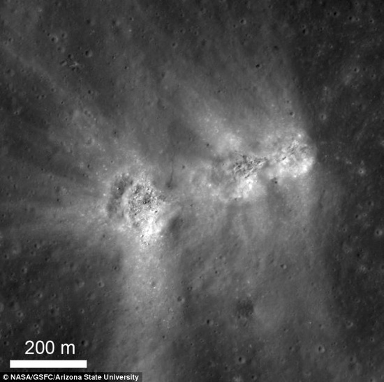 Picture 1 of Close up of 3 mysterious holes on the Moon