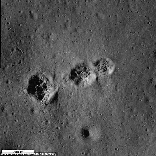 Picture 2 of Close up of 3 mysterious holes on the Moon