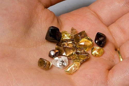 Picture 2 of Comfortable travelers dig diamonds for free at an American park
