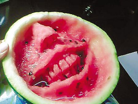 Picture 6 of Create interesting shapes on watermelon with a spoon