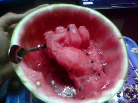 Picture 8 of Create interesting shapes on watermelon with a spoon