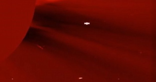 Picture 1 of Detecting a strange UFO object flying across the Sun.
