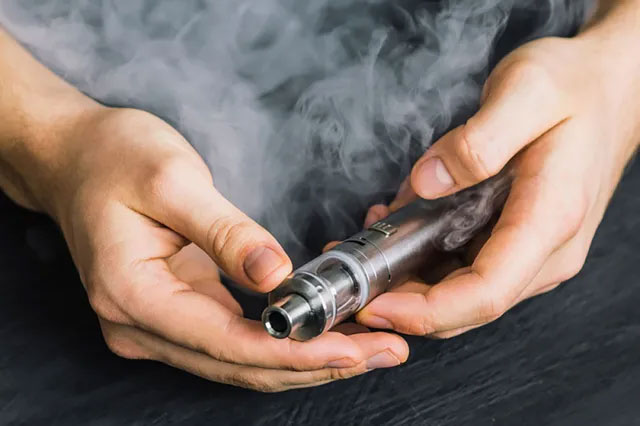 Picture 1 of Electronic cigarette smoking can create toxic chemicals that damage blood vessels