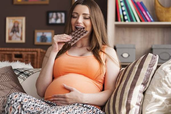 Picture 2 of Explain the science behind the pregnant woman's curious appetite