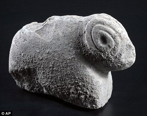 Picture 1 of Find a 9,000-year-old animal statue