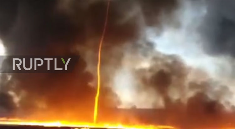 Picture 1 of Firefighters took a scene of a strange fire tornado bombarding the sky