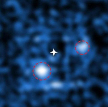 Picture 2 of First recorded the 'eating' planet image around the young star
