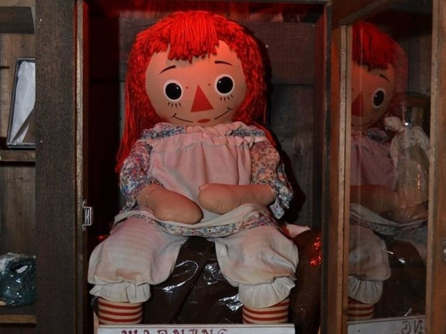 Ghostly Dibbuk wine cabinet and Annabelle - scary haunted dolls images 3