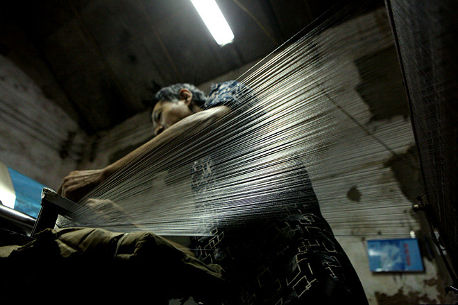Picture 12 of Go to Van Phuc village to see how elaborate the silk production process is