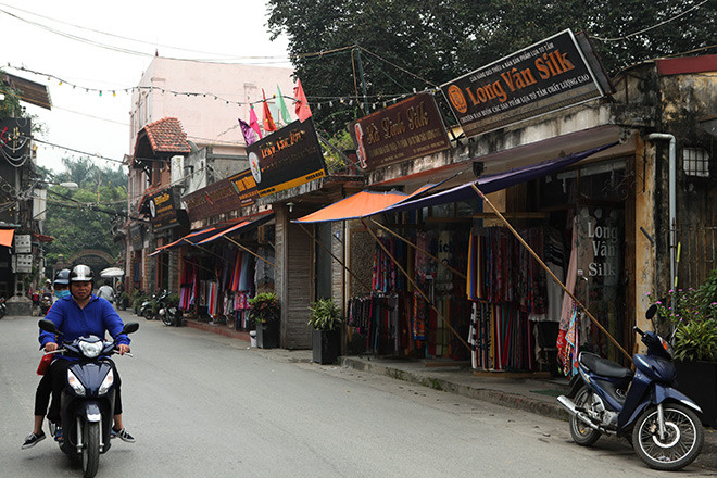Picture 2 of Go to Van Phuc village to see how elaborate the silk production process is