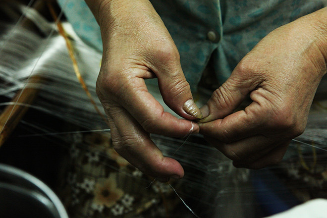 Picture 9 of Go to Van Phuc village to see how elaborate the silk production process is