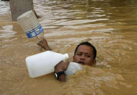 Picture 3 of Hundreds of people died and went missing because of the storm in the Philippines