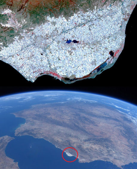 Picture 3 of In Spain there is a greenhouse area planted close to trees, visible from orbit