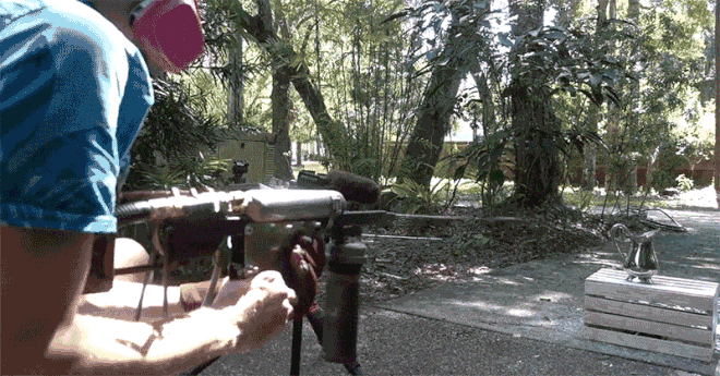 Picture 1 of Instead of shooting water, this guy made a molten metal gun