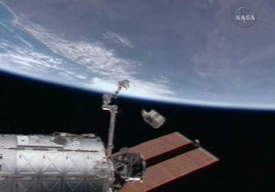 Picture 1 of International space station discharges excess equipment into space