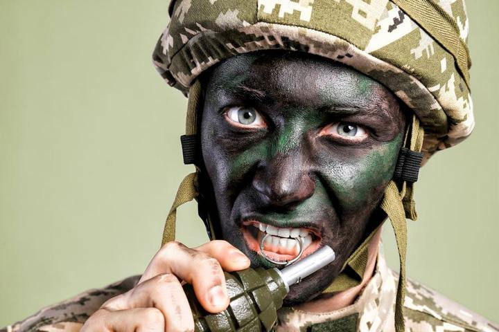 Picture 1 of Is it possible to pull grenades with teeth like in movies?