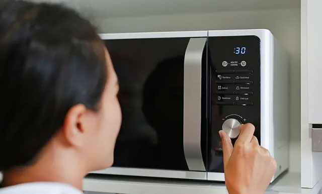 Picture 1 of Is standing in front of the microwave safe to use?