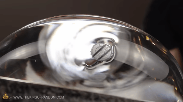 Picture 7 of Learn super fun magic: Make coins float on the water