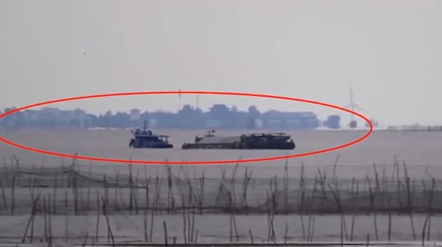 Picture 1 of 'Mysterious ghost city' reappears in the middle of the lake