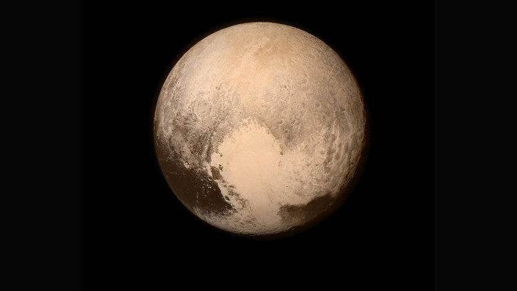 Reveal the secret of a giant heart shape on Pluto images 1