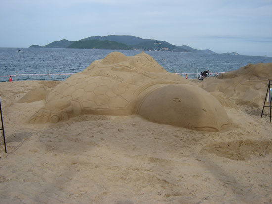 Sculpture in the sand because of the green planet images 3