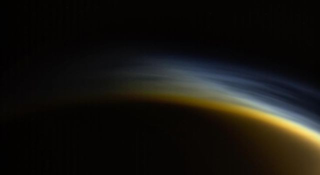 Picture 1 of See the 'foggy sunset' on Saturn's moon