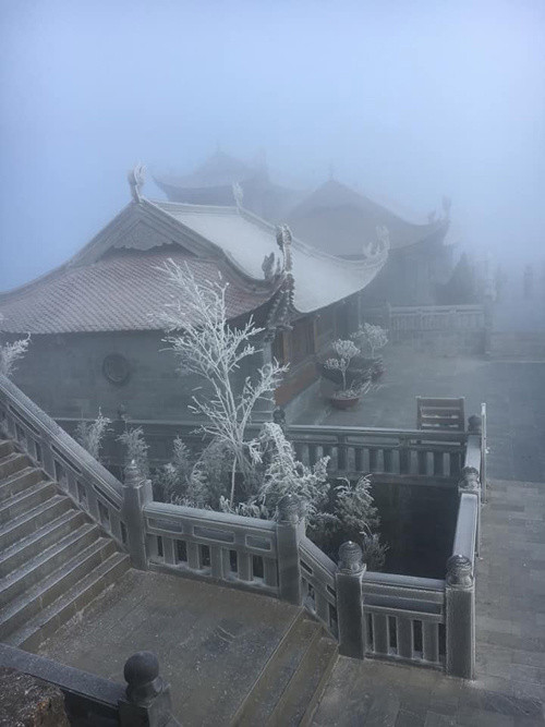 Picture 7 of Snow ice covered white Fansipan peak and Hoang Lien forest