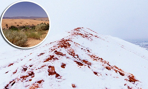 Picture 1 of Snow is dyed red like blood covering the Sahara desert